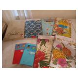Assorted new vinyl tablecloths, mostly 52x70 in,