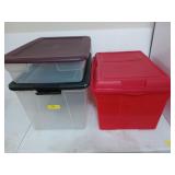 Three empty storage tubs, two are clear, one is