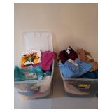 Two count 58 quart plastic tubs filled with