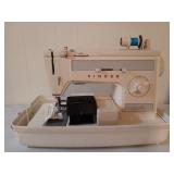 Singer sewing machine model 1021 in carrying