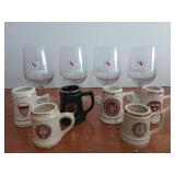 Four Kronenbourg glasses, and six collectible