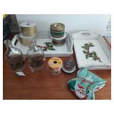 Two serving trays with Holly motif, the largest