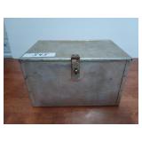 Metal storage bin filled with hot glue guns etc,