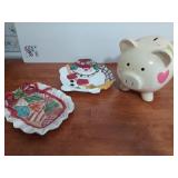 Piggy bank and two Christmas cookie plates, the