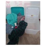 Two storage containers, one is empty, one is