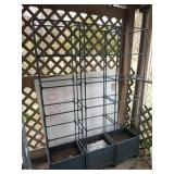 Three vertical planters on wheels, 6 ft by 15 by