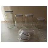 Four glass Golden harvest canisters, 9-5 in,