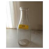 One pint glass milk bottle, 10 in