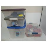 Four assorted clear storage bins, one is filled