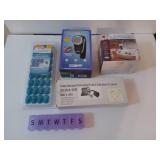 Two pill boxes, and electric Conair lint