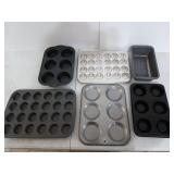 Six assorted baking trays, two are for mini