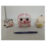 Three piggy banks, the largest is 5x7 in
