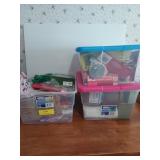 Three storage bins filled with