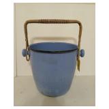 Blue enamel bucket with rattan wrapped handle,