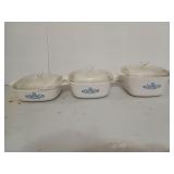 Four CorningWare dishes, one quart to 1 and 3/4