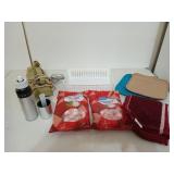 Assorted kitchen goodies, including two unopened