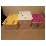 Three empty totes with lids
