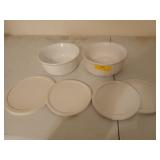 Two CorningWare 1.5 quart dishes with four lids,