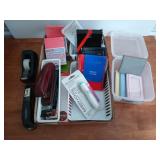Flat of office supplies, including staplers,