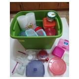 Green tote filled with plastic food storage