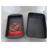 Two baking pans, one is a T-Fal 10x14 roaster,
