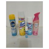 Three cans of Lysol, a can of Pledge, and some