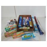 Assorted baking papers/foil/sandwich bags, some