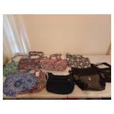 Eight assorted purses, two are new with tags,