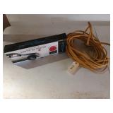 50 ft yellow extension cord, and a new in package