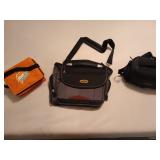 Eddie Bauer luggage bag, a Sony camera case, and