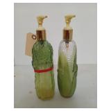 Pair of 10 inch Avon soap dispensers, one is