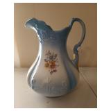 11 inch blue wash pitcher with floral pattern