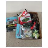 Flat filled with fishing lures, bait, etc.