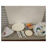 Bag filled with assorted cake stands, risers,