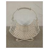 White wrought iron and rattan rack, 15x13 in