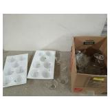 Cardboard box filled with punch bowl cups, wine