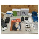 Box filled with all sorts of electrical supplies