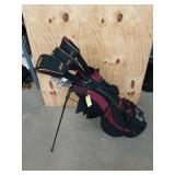 Maroon and black Wilson golf bag with set of