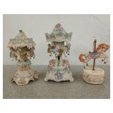 Three carousel horse music boxes, 8 to 10 in