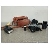 Minolta XG-1 camera with extra zoom lens and flash