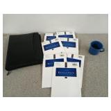 A faux leather trapper keeper, seven pairs of