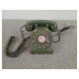 Green rotary phone, by Bell system, originally