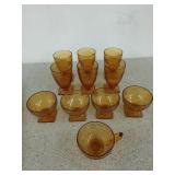 11 pieces of amber glass, including six juice