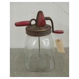 14-in glass butter churn with red accents