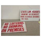 Two metal signs: "State law prohibits