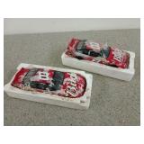 Two #8 Budweiser diecast Action race cars, in
