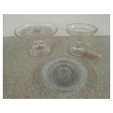 Two 5 in glass pedestal candy/cookie dishes, and a