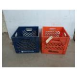 Two milk crates, one blue, one orange