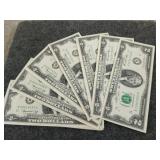 Fifteen $2 bills with consecutive serial numbers,