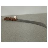 Tiki machete, 29 in, wooden handle is a little